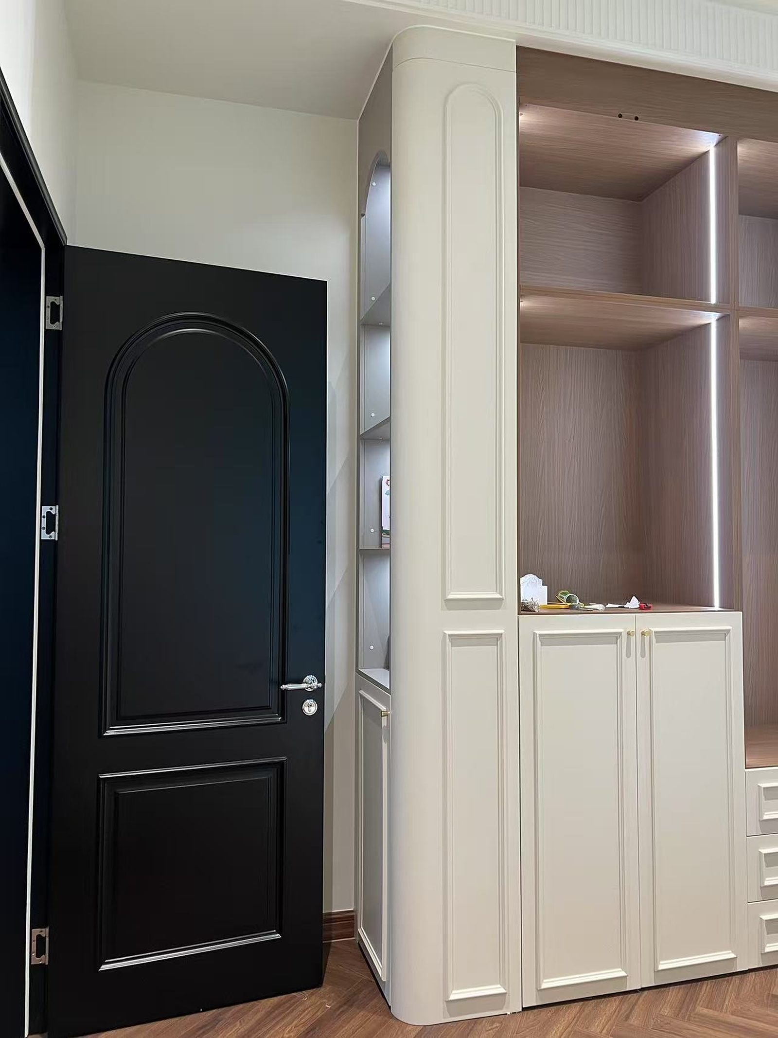 Coordinated built-in cabinetry along a hallway